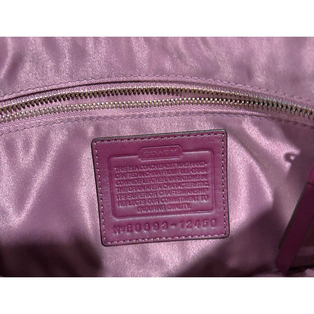 Coach, 6in x 11 in x1.25 inches Hampton Lindsey Magenta Leather Turn Lock Clutch - Picture 10 of 11